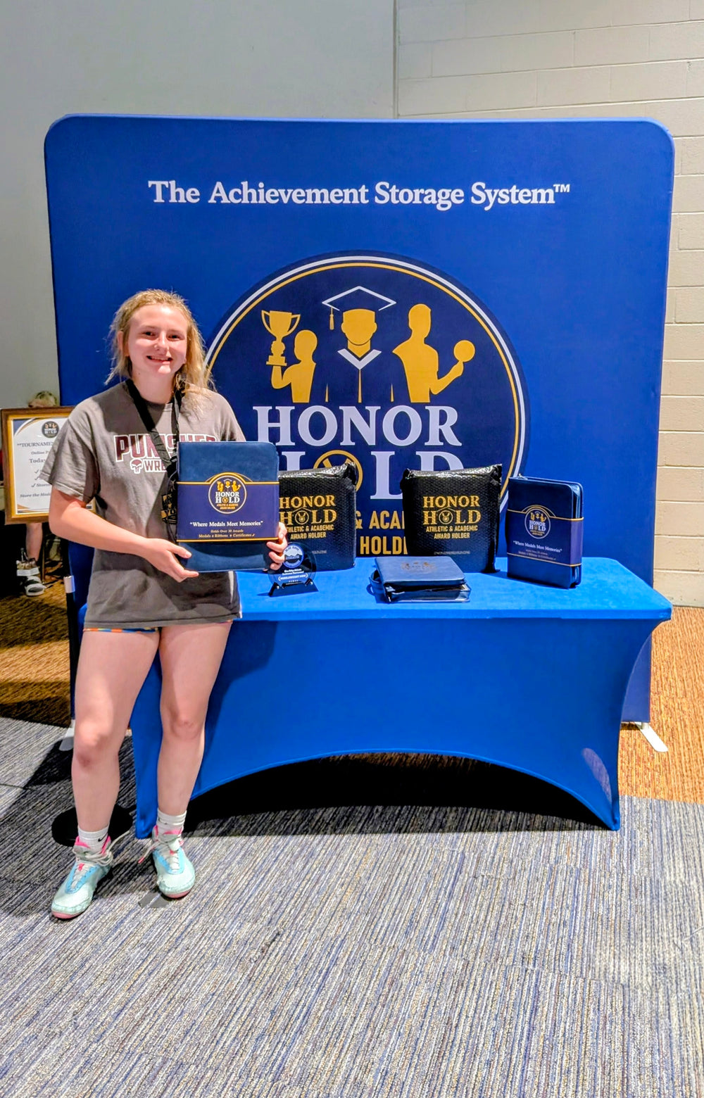 Student athlete with an Honor Hold binder